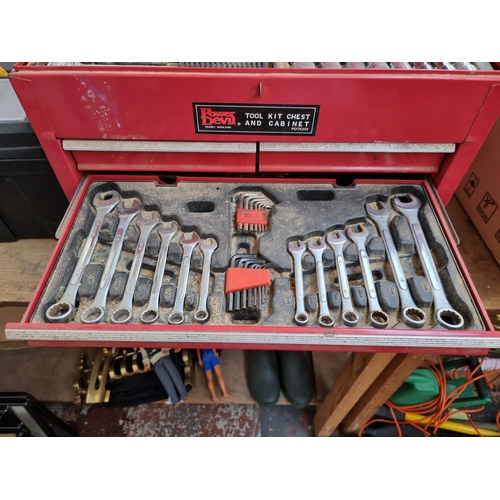 338 - A collection of tools to include Power Devil toolkit chest and cabinet containing a near full set of... 