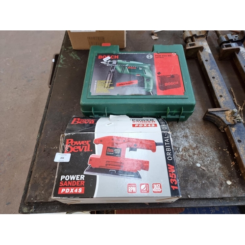 356 - Two boxed 240V powertools, one Power Devil power sander and one Bosch PSV600RE hammer drill