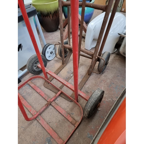 387 - Two metal sack trucks