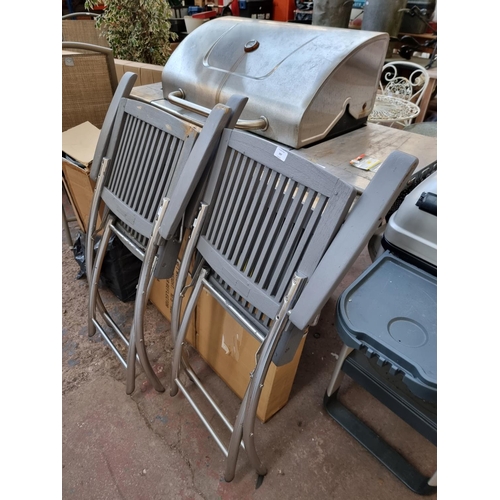 397 - Four items, two grey painted and chrome plated folding chairs, one patio heater unit and one patio h... 