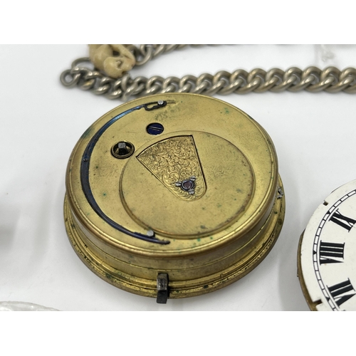 2497 - A collection of pocket watch parts to include four movements with dials, white metal Albert chain, A... 