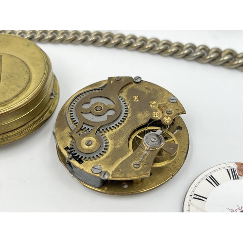 2497 - A collection of pocket watch parts to include four movements with dials, white metal Albert chain, A... 