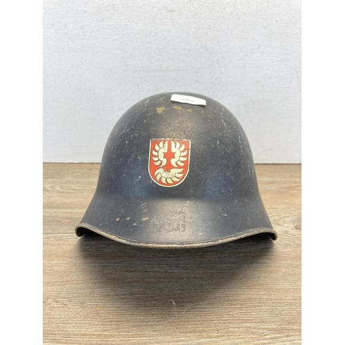 1253 - A WWII Swiss M1918/40 military helmet