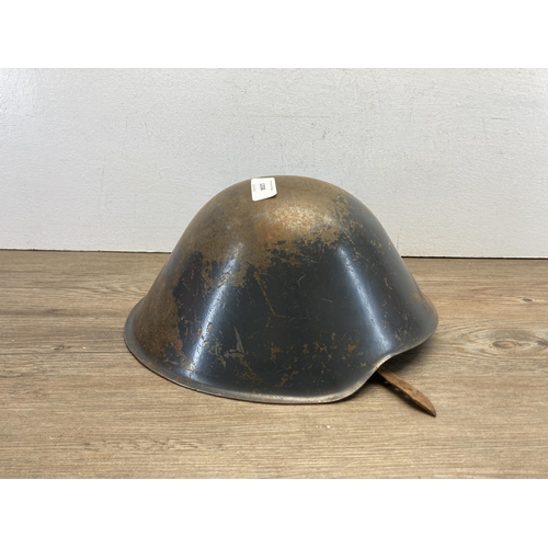 1258 - An East German M1956 military helmet