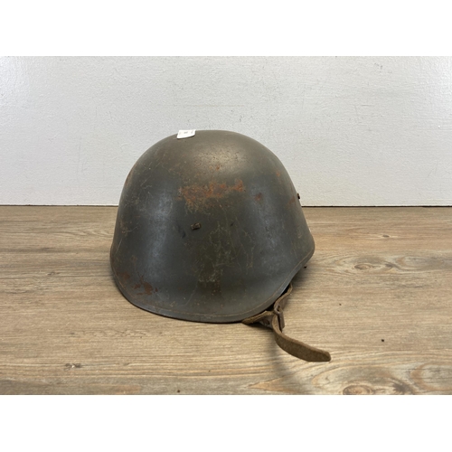 1260 - A WWII Danish M/23-41 military helmet