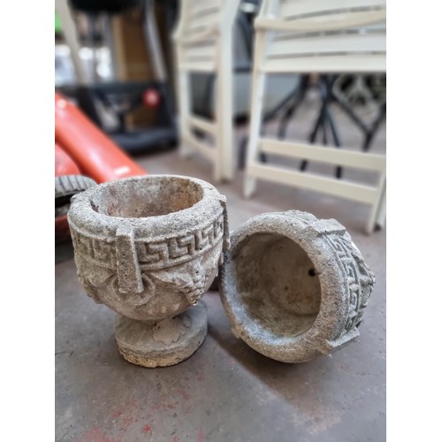 383 - A pair of cast stone planters on pedestal base