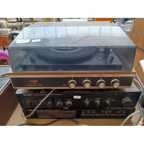 591 - Three items of vintage hi-fi, one WYE Electronics Ltd Audio 25 three-speed record player, one Rotel ... 