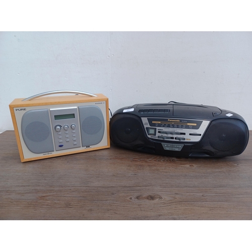 603 - Two items, one Panasonic RX-DS12 portable two-band radio/cassette deck/CD player and one Pure 
Evoke... 