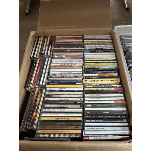 400 - Seven boxes containing a large quantity of CDs and VHS tapes