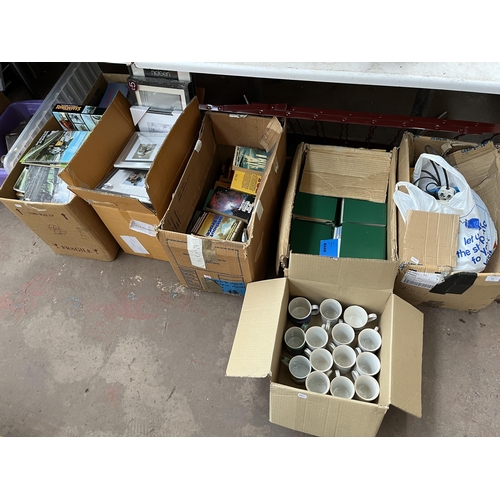 403 - Seven boxes containing railway books, picture frames, ceramic mugs etc.