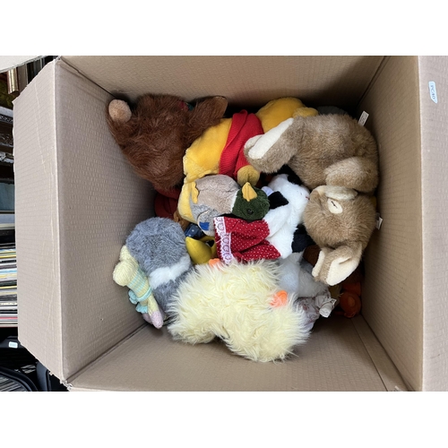 412 - Two boxes containing a large quantity of soft toys