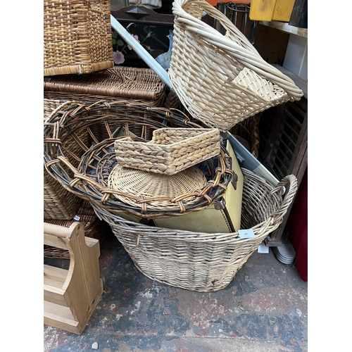 407 - A large collection of wicker ware and small furniture to include early 20th century oak framed silk ... 