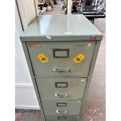 174 - A vintage grey metal four drawer office filing cabinet