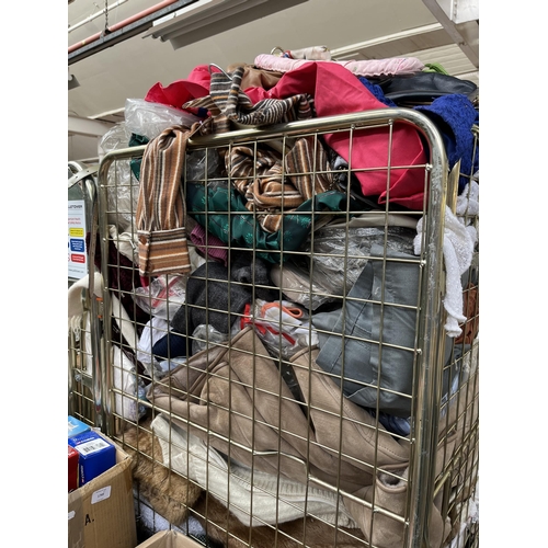 432 - A cage containing a large quantity of clothing (cage not included)