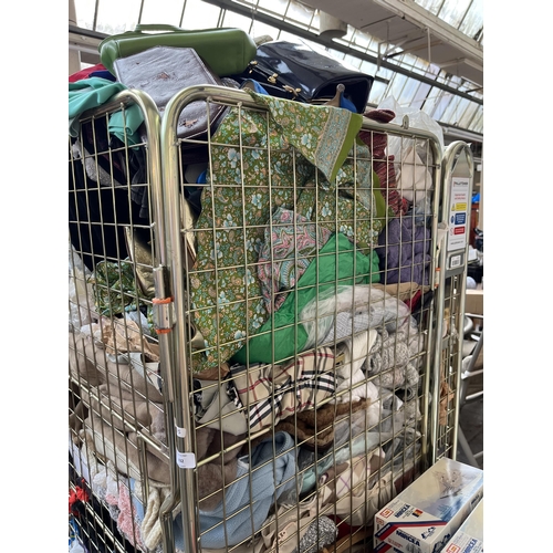 432 - A cage containing a large quantity of clothing (cage not included)