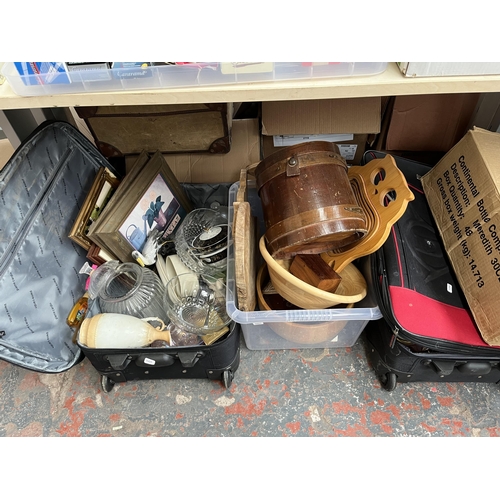 438 - Three boxes and two suitcases containing glass candle holders, treenware, glassware etc.