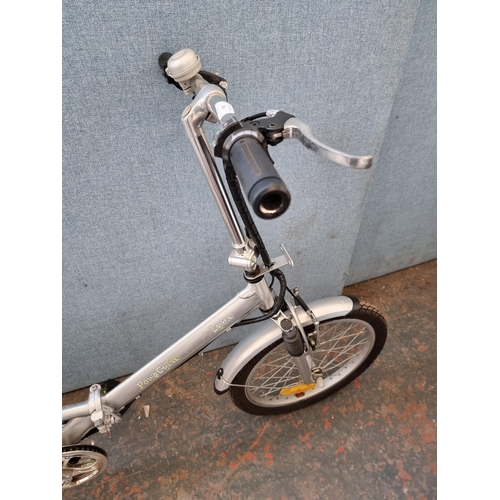 283 - A PowaCycle Lynx electric folding bike with key, battery and charger (all in office)