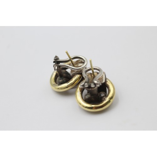 1002 - Two pairs of 9ct gold and silver statement earrings - approx. gross weight 26.36 grams