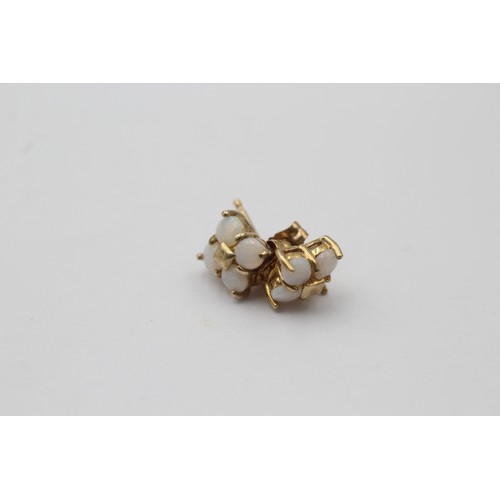 1003 - Three pairs of 9ct gold gemstone set stud earrings, one diamond, one opal and one sapphire and diamo... 