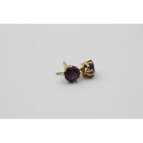 1007 - Three pairs of 9ct gold earrings, one garnet, one amethyst and one peridot - approx. gross weight 5.... 