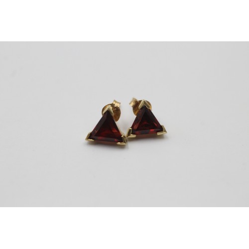 1007 - Three pairs of 9ct gold earrings, one garnet, one amethyst and one peridot - approx. gross weight 5.... 