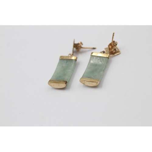 1009 - Two pairs of 9ct gold jade drop earrings - approx. gross weight 4.8 grams