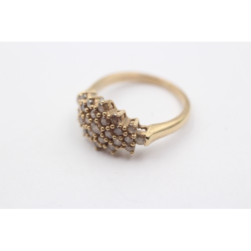 1015 - A 9ct gold diamond dress ring - approx. gross weight 3.7 grams