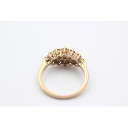 1015 - A 9ct gold diamond dress ring - approx. gross weight 3.7 grams