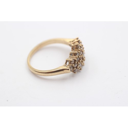 1015 - A 9ct gold diamond dress ring - approx. gross weight 3.7 grams