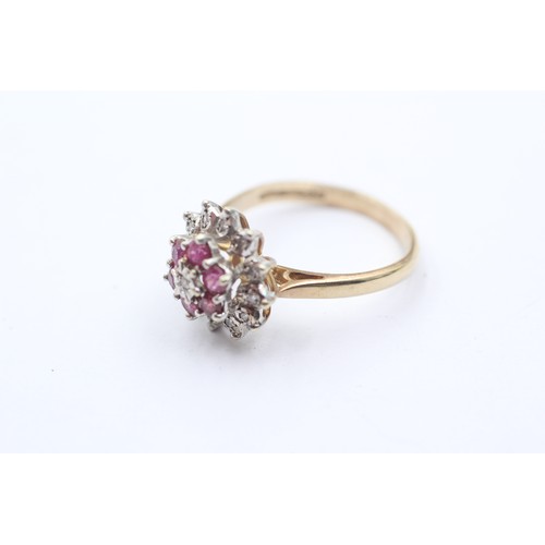 1020 - A 9ct gold diamond and ruby halo ring - approx. gross weight 3.5 grams