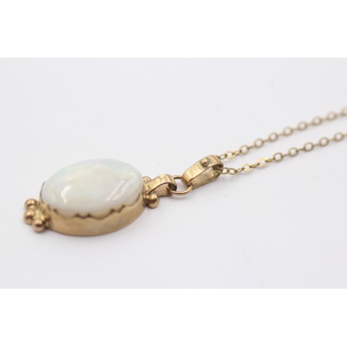 1024 - A 9ct gold opal pendant necklace - approx. gross weight 4.2 grams