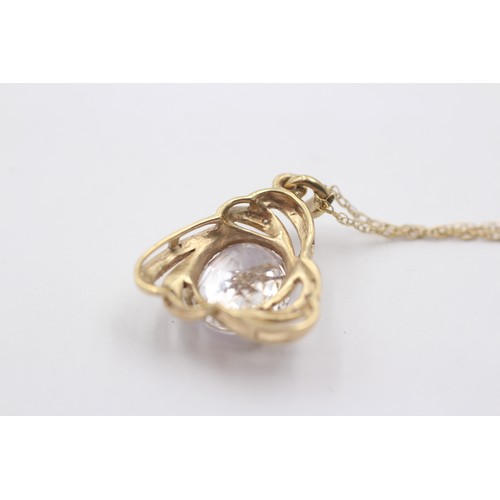 1025 - A 9ct gold diamond and white spodumene pendant necklace - approx. gross weight 4.4 grams