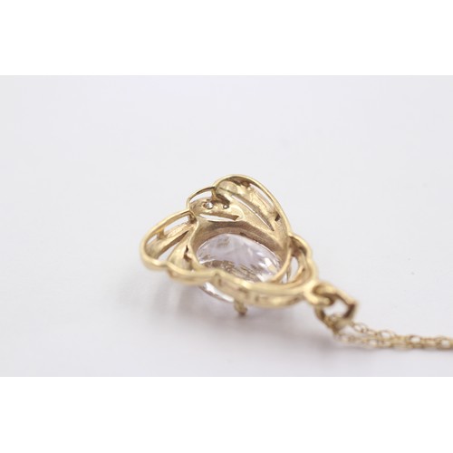 1025 - A 9ct gold diamond and white spodumene pendant necklace - approx. gross weight 4.4 grams