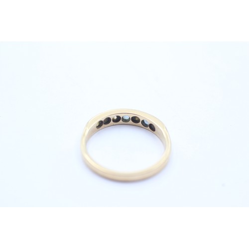 1033 - A 9ct gold diamond and sapphire seven stone ring - approx. gross weight 2.1 grams