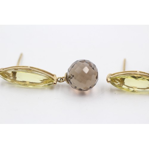 1035 - A pair of 9ct gold citrine and smoky quartz drop earrings - approx. gross weight 5.2 grams