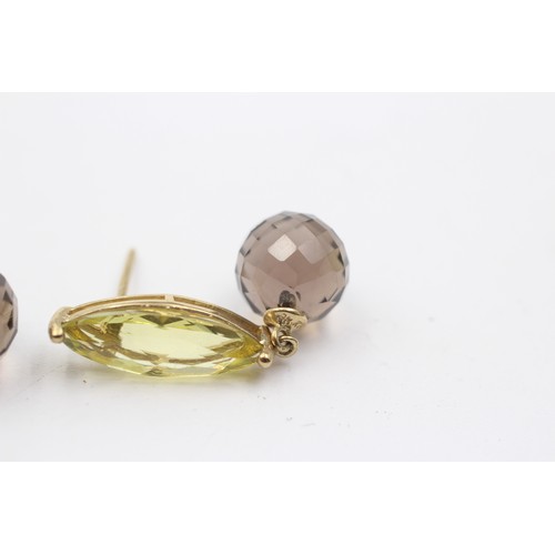 1035 - A pair of 9ct gold citrine and smoky quartz drop earrings - approx. gross weight 5.2 grams