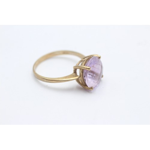 1037 - A 9ct gold amethyst single stone ring - approx. gross weight 3.7 grams