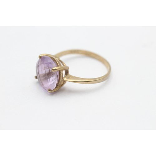 1037 - A 9ct gold amethyst single stone ring - approx. gross weight 3.7 grams