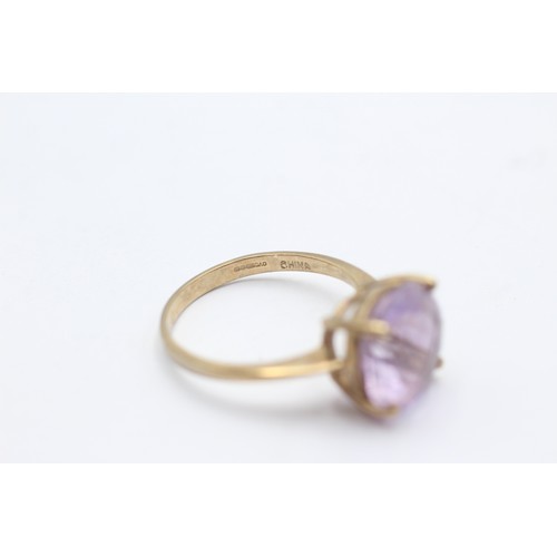 1037 - A 9ct gold amethyst single stone ring - approx. gross weight 3.7 grams