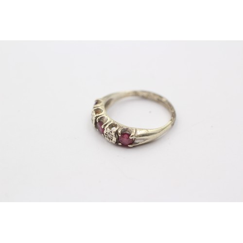 1042 - A 9ct white gold diamond and ruby five stone ring - approx. gross weight 2.1 grams