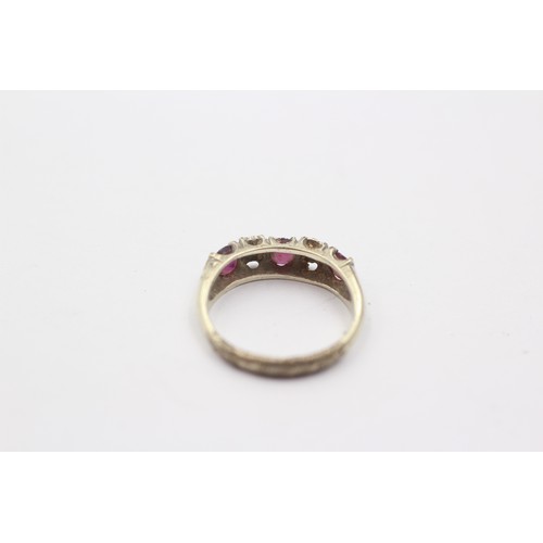 1042 - A 9ct white gold diamond and ruby five stone ring - approx. gross weight 2.1 grams