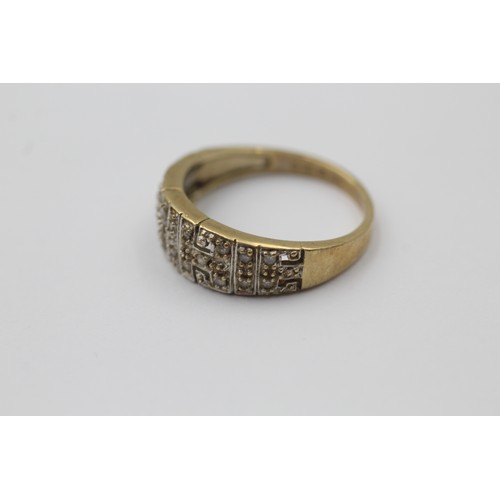 1049 - A 9ct gold diamond statement ring - approx. gross weight 2.9 grams