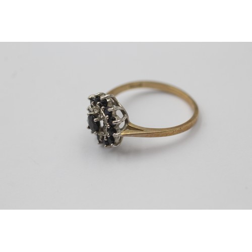 1056 - A 9ct gold sapphire and diamond cluster ring - approx. gross weight 1.9 grams