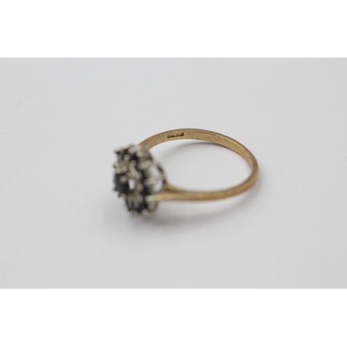 1056 - A 9ct gold sapphire and diamond cluster ring - approx. gross weight 1.9 grams