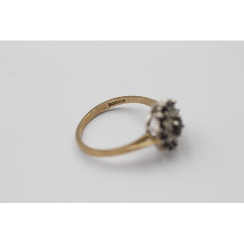 1056 - A 9ct gold sapphire and diamond cluster ring - approx. gross weight 1.9 grams