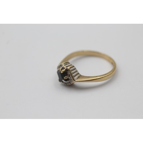 1057 - A 9ct gold sapphire and diamond dress ring - approx. gross weight 2.1 grams