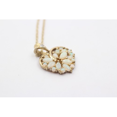 1066 - A 9ct gold diamond and opal cluster pendant necklace - approx. gross weight 3.1 grams