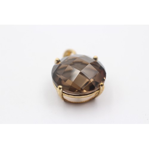 1070 - A 9ct gold smoky quartz pendant - approx. gross weight 6.7 grams