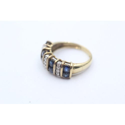 1073 - A 9ct gold diamond and sapphire dress ring - approx. gross weight 3 grams