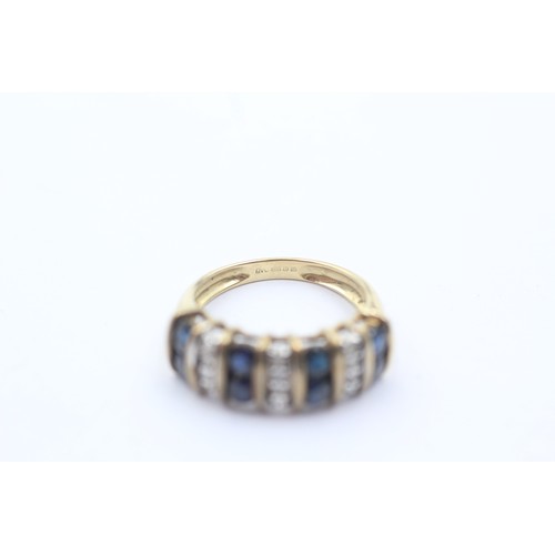 1073 - A 9ct gold diamond and sapphire dress ring - approx. gross weight 3 grams